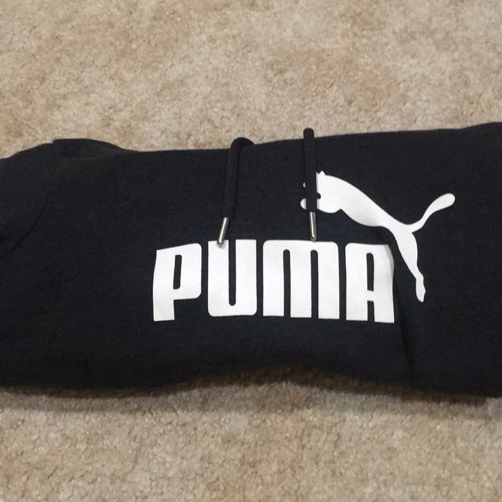 A charcoal grey and white Puma sweatshirt